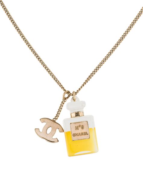 chanel charm bracelet perufme bottle|chanel gold burst necklace.